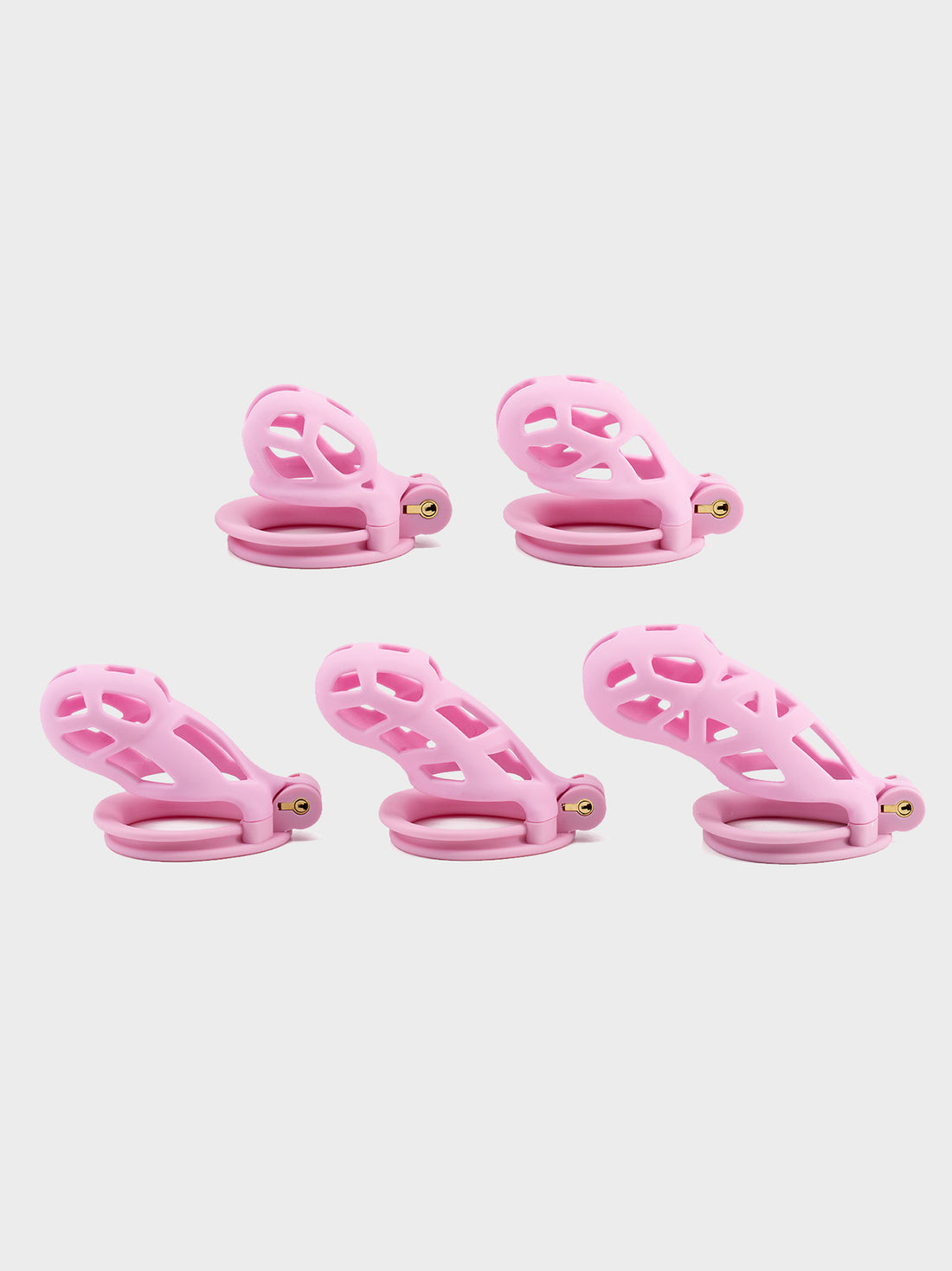 The full range of pink color cobra chastity cages.