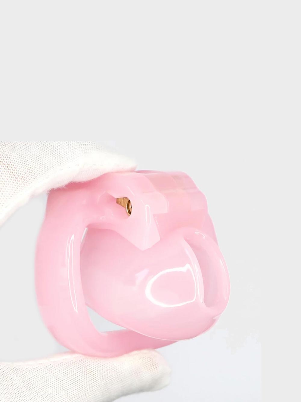 This tiny chastity cage is known as the Nub V4