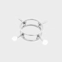 A metal cock cage that has 4 screws to torture the submissive, available at Chastity Cages Co