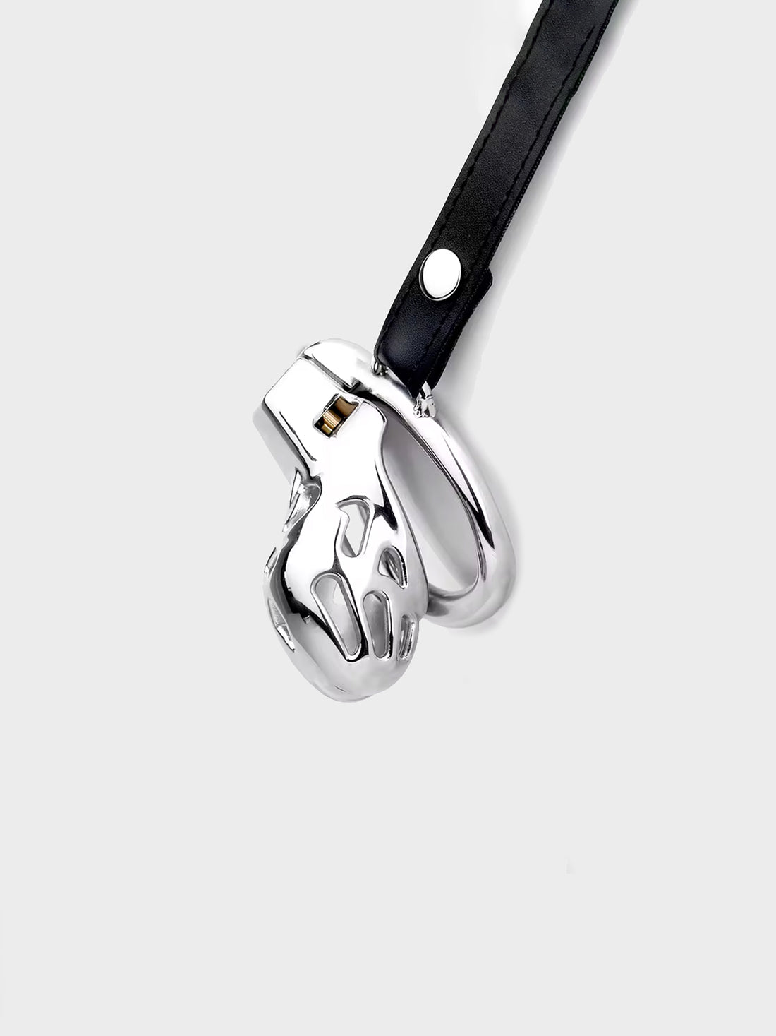 A fully steel chastity cage, on a leather belt