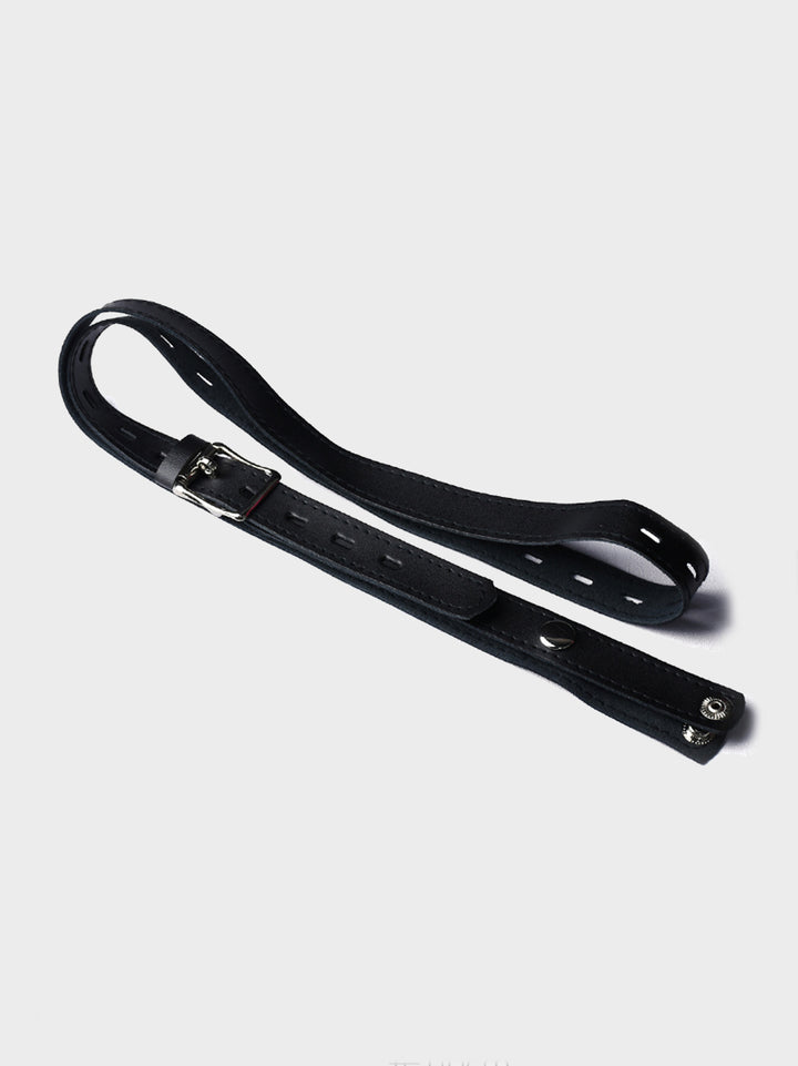 A faux leather belt which attached to male chastity cages