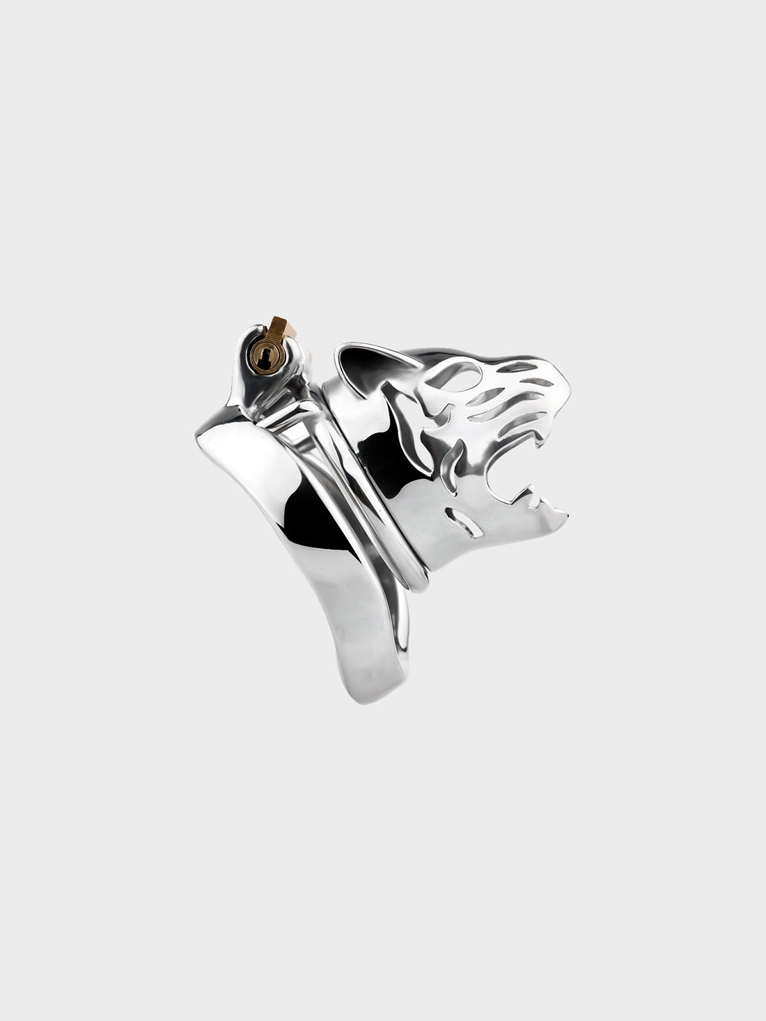 A 2 inch steel chastity cage resembling the head of a tiger.