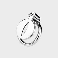 A flat chastity cage made from steel and measuring barely half an inch.