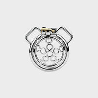 Stainless steel chastity cage that can attach to a leather belt.