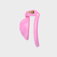 very short pink chastity cage made from plastic