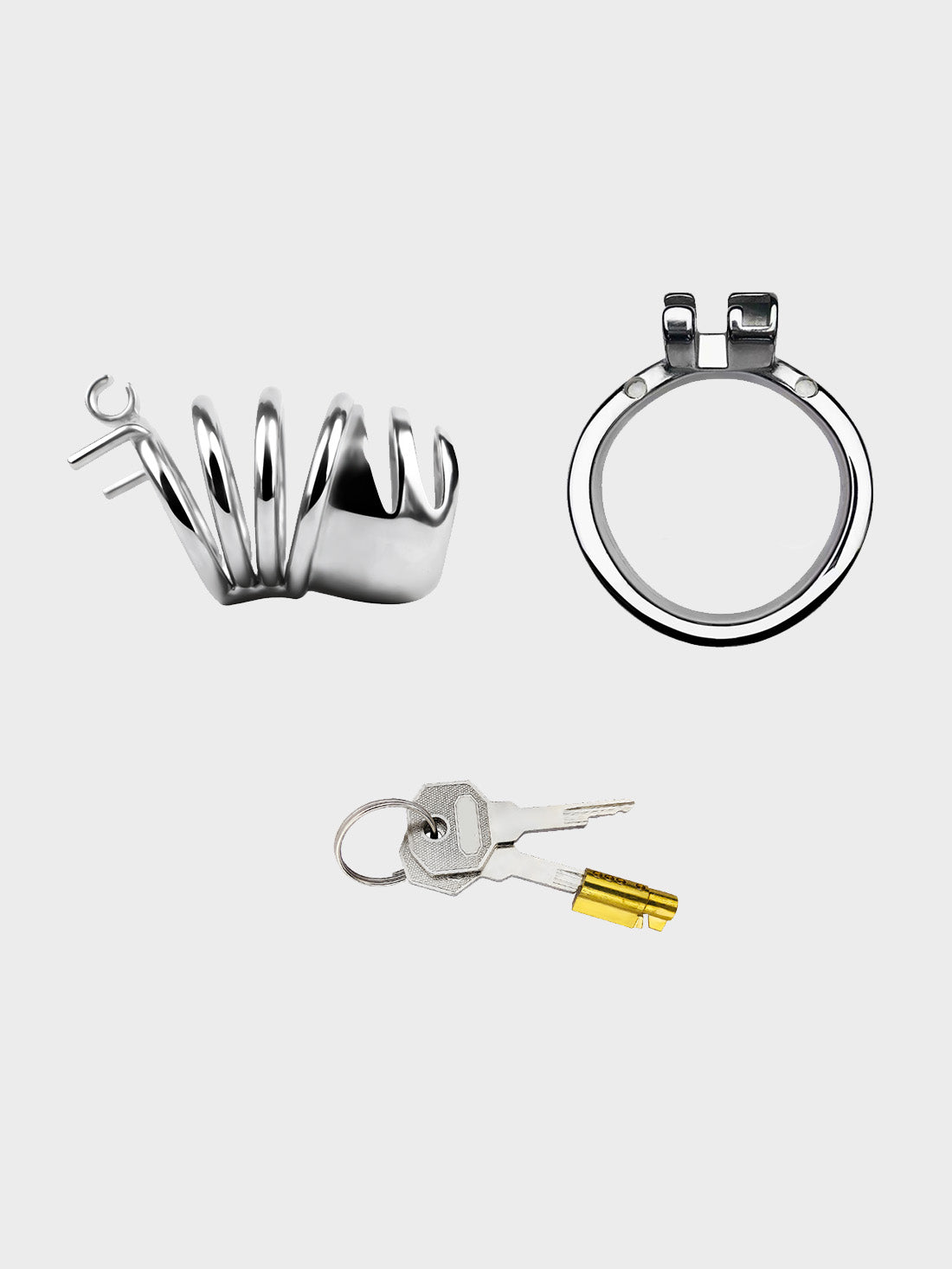 Set of steel chastity cage components including a lock body, key, and additional parts on a white background.