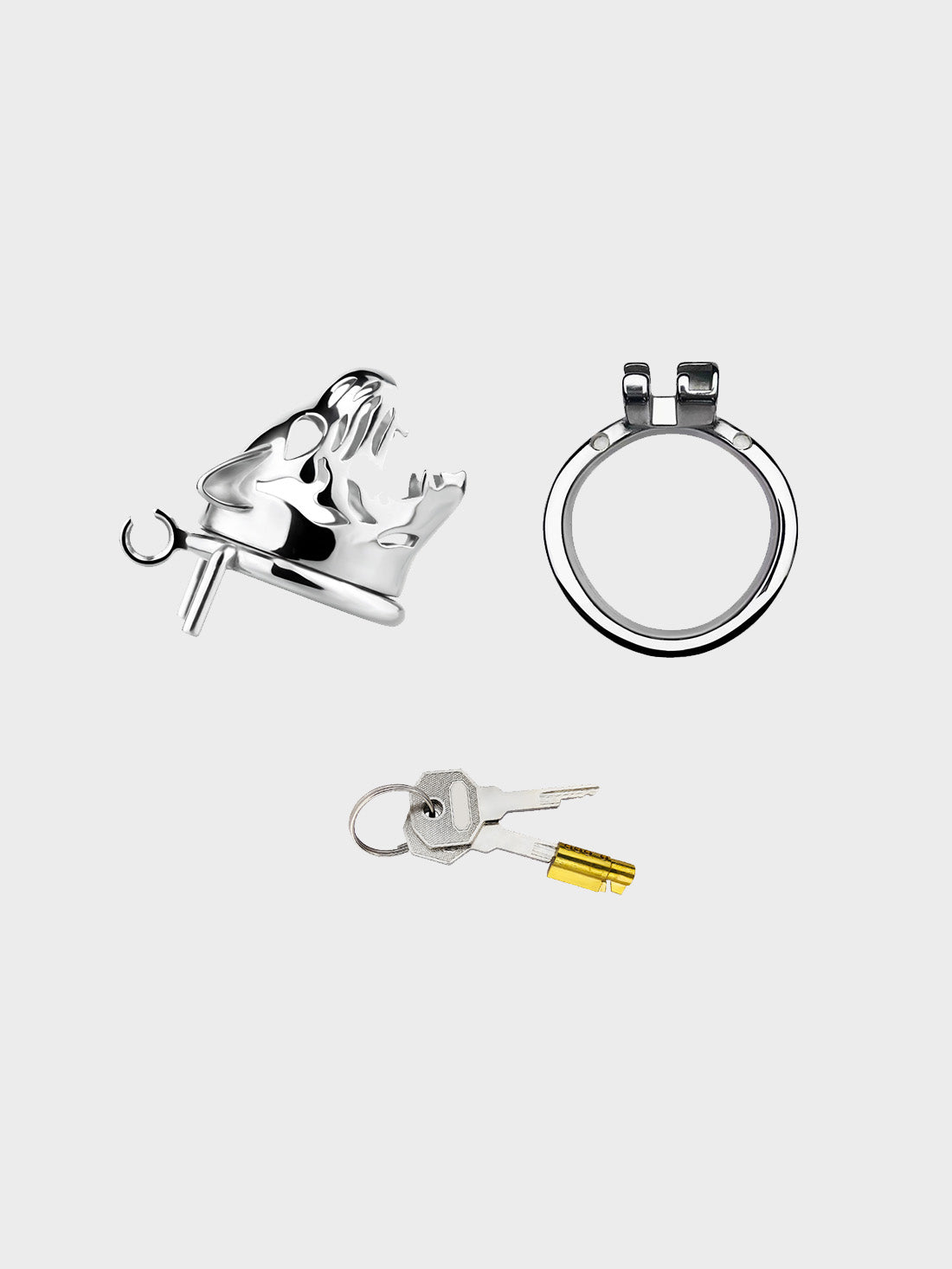 A locking chastity cage sits in parts on a grey background. This is preferred by submissive men in power exchange relationships.