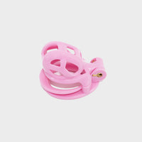 one of the smallest pink chastity cages that you can buy.