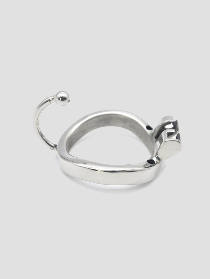 An additional steel chastity cage ring