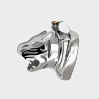 This chastity cage is shaped like a tigers head and made from solid steel