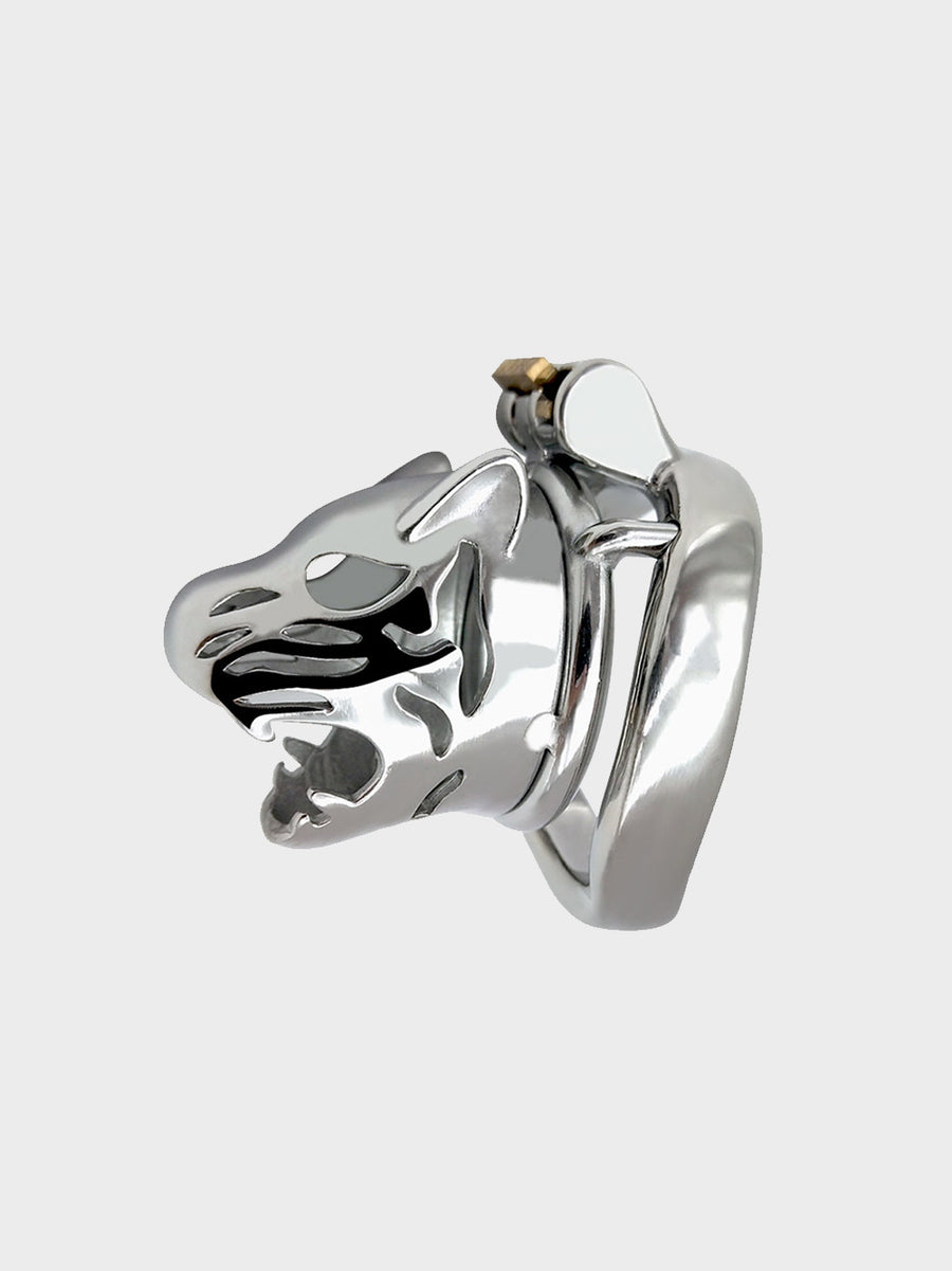 This chastity cage is shaped like a tigers head and made from solid steel